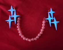 Load image into Gallery viewer, Triple Atomic Star Cardigan Clips in Shimmery White and Black