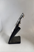 Load image into Gallery viewer, Triple Atomic Star Cardigan Clips in Shimmery White and Black