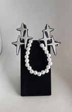 Load image into Gallery viewer, Triple Atomic Star Cardigan Clips in Shimmery White and Black