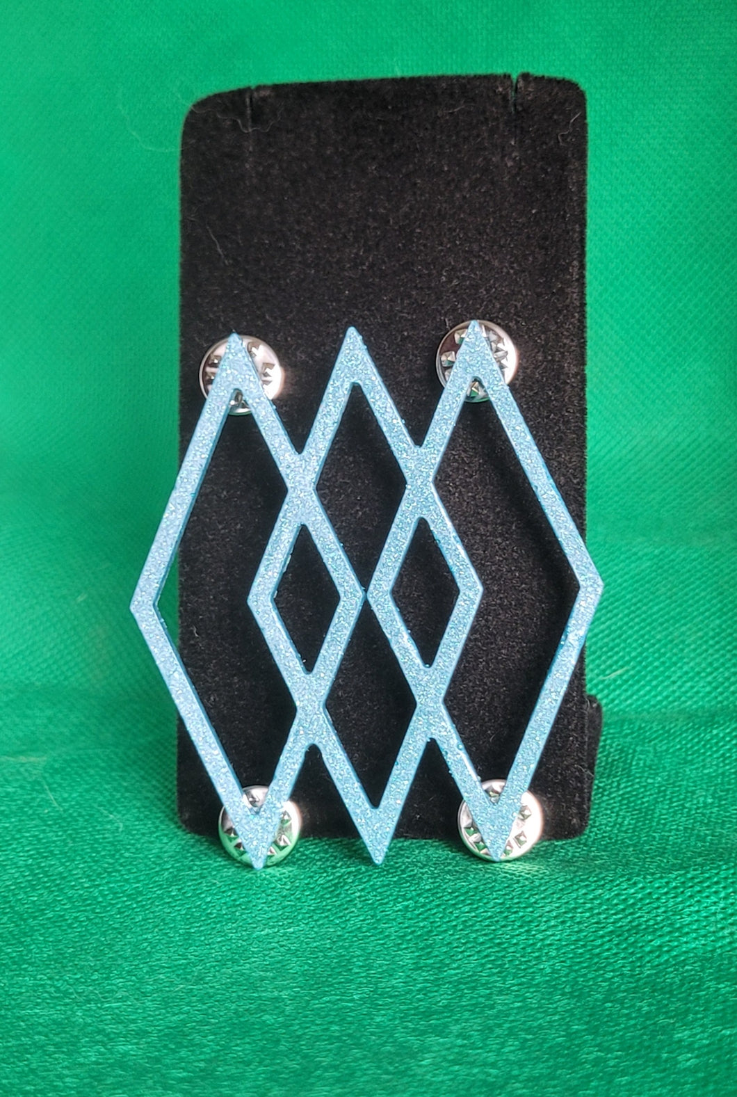 Triple Open Atomic Diamond Brooch in Ice Blue