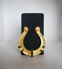 Load image into Gallery viewer, Horseshoe Brooch in gold and black resin
