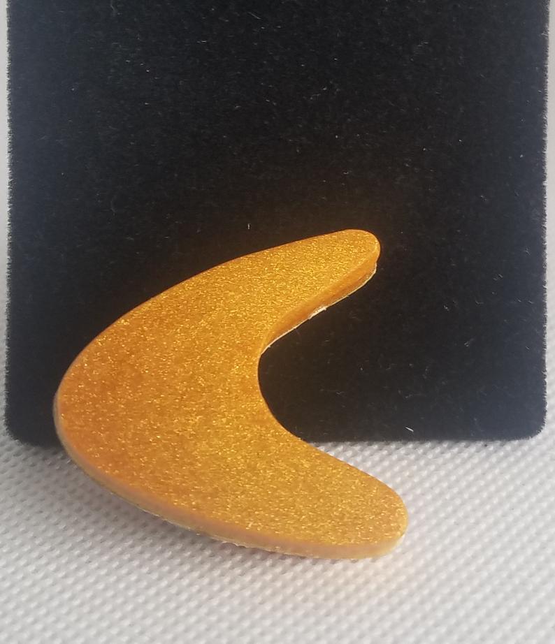 Small Atomic Boomerang Brooch in gold resin